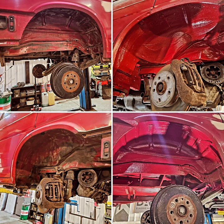 Vehicle underside photographed on the workshop lift.